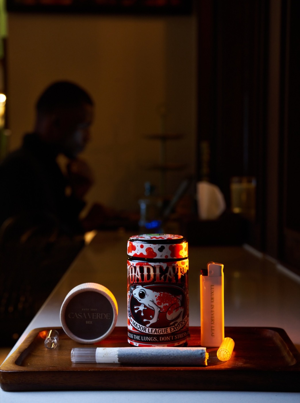 Toadlatti jar on a walnut wood tray with a lighter